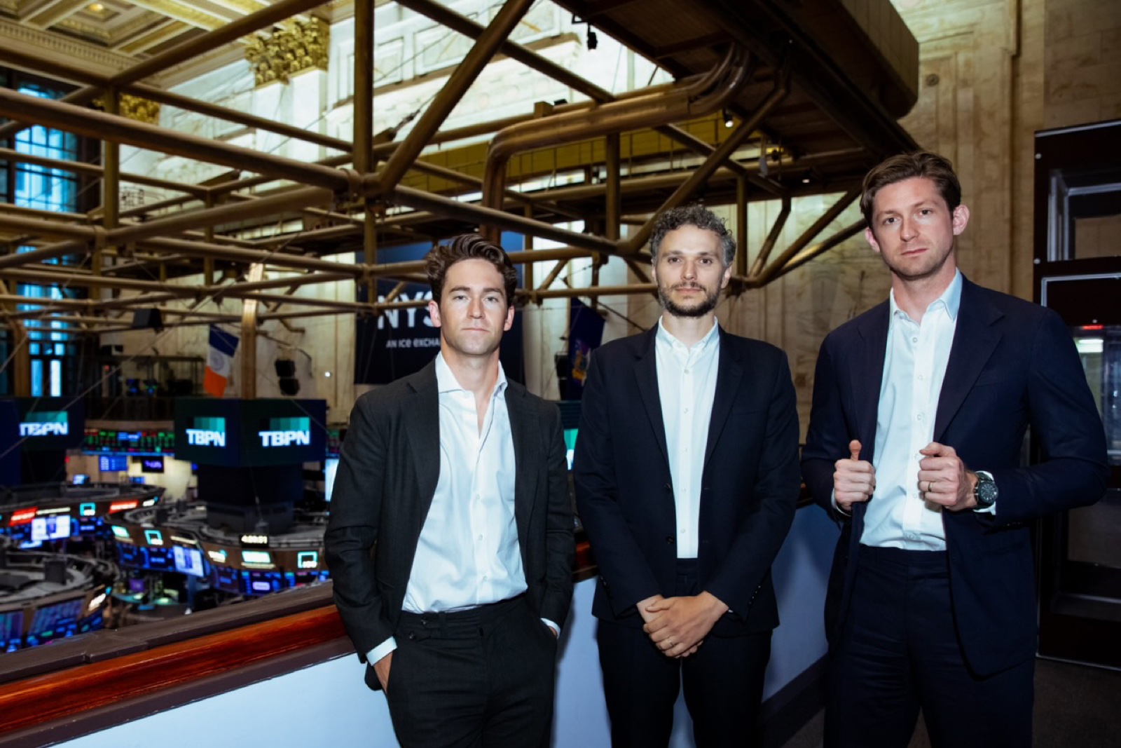 Dylan Abruscato with John Coogan and Jordi Hays at the New York Stock Exchange.